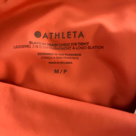 LIKE NEW Athleta Elation Train Logo 7/8 Leggings - M/P - Orange - Picture 5 of 11